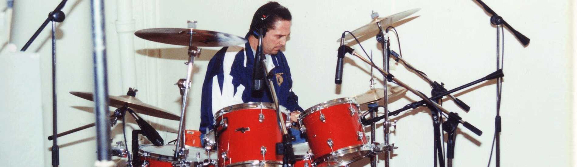 A Drummer Playing Drums in the Studio
